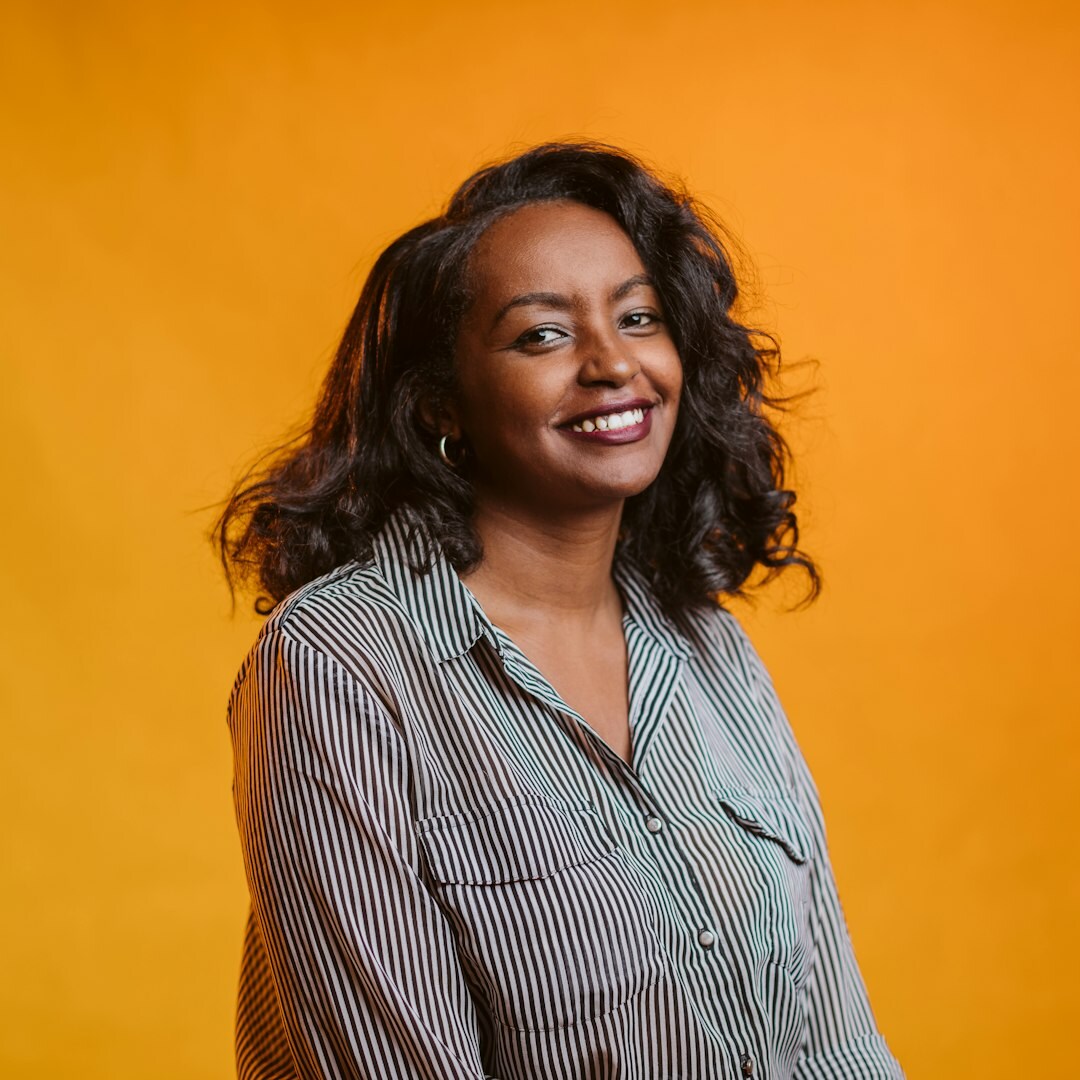 Female media trainer smiling professionally